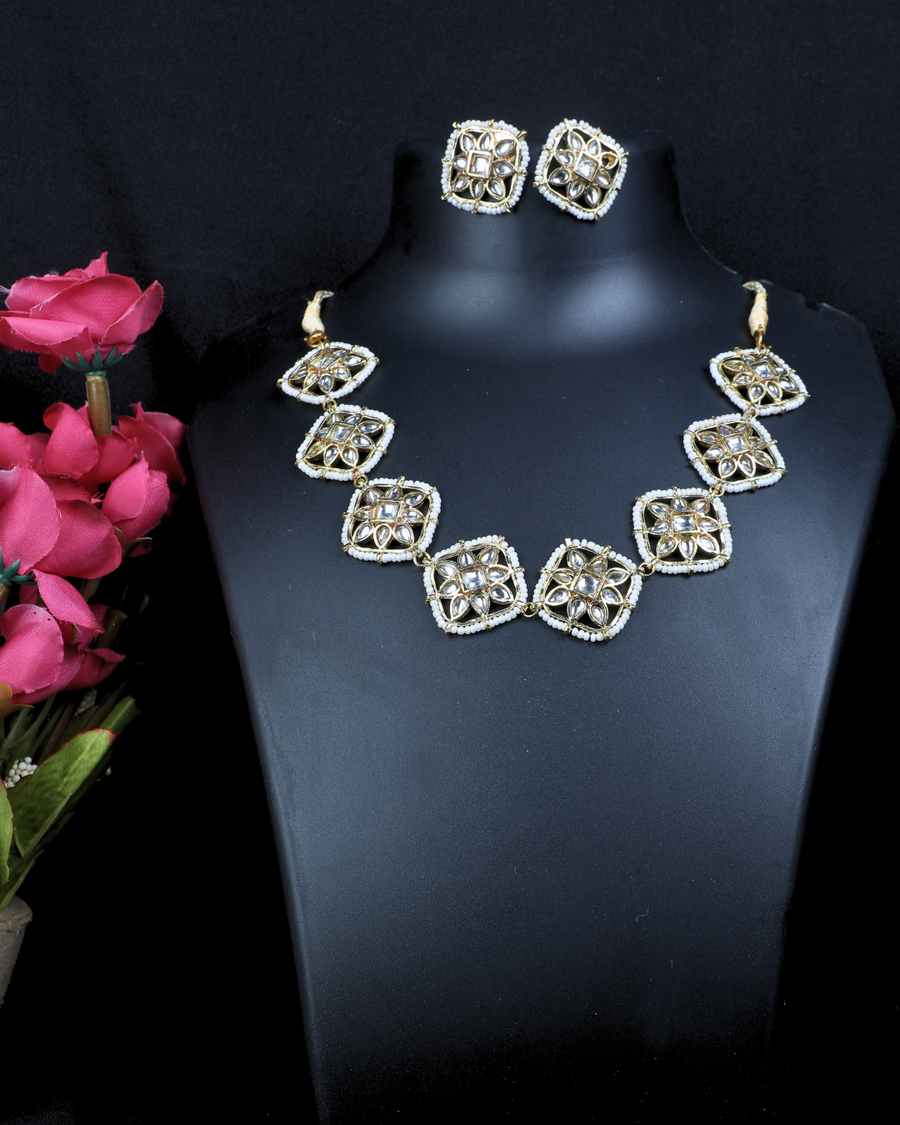 white moti and whit kundan jewellery.