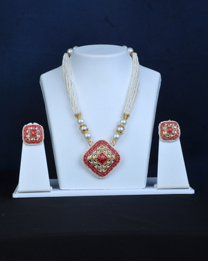 white moti and red  pendal minakari  jewellery