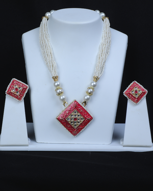 White moti and red pandal minakari  jewellery